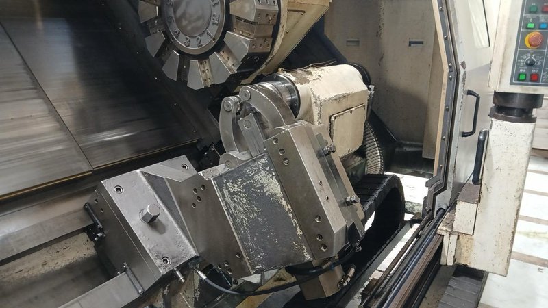 Doosan Puma 800L, 2007 – SMW Hyd Steady, 12″ Big Bore, Chip Conveyor