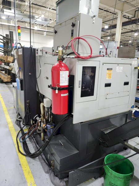 Nexturn SA-38 CNC Swiss Lathe, 38mm, 7-Axis, Turning Length: 8.3", 13 Tools, C-Axis, 8000 RPM, Fanuc 18i-TB, High Press. Coolant, Fire Suppression, Mag. Barfeeder, New 2006
