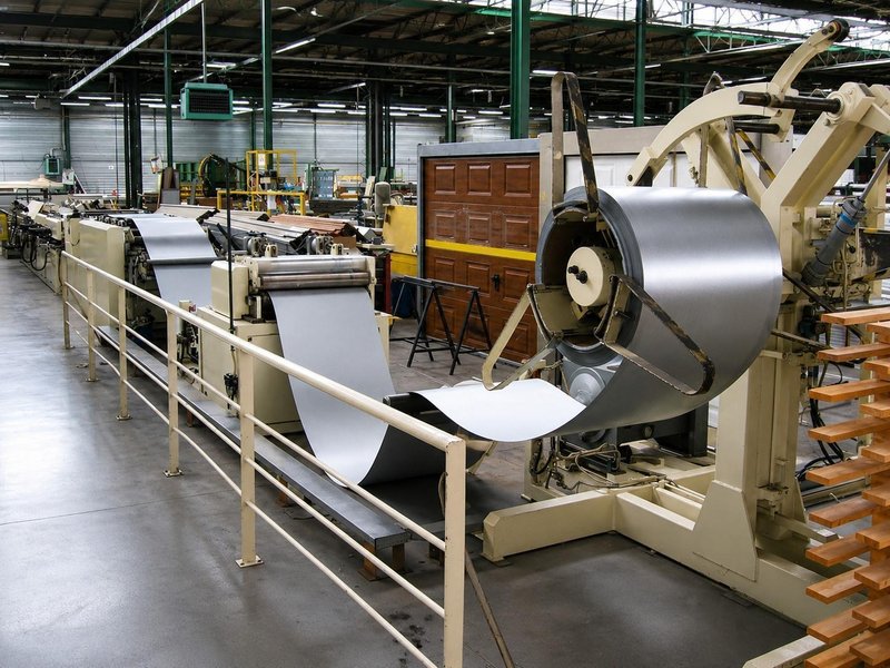 Jensen - Sandwich panel line for sectional gates