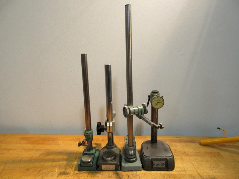 Various Height Gage Stands 10"-25" (4); 1 Mitutoyo, 1 Tumico w/ Indicator, 2-No Name- Auction Item