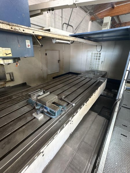 Takumi V32 VMC, 2007 – 4th Axis, CAT50, Box Way, TSC, Chip Conveyor