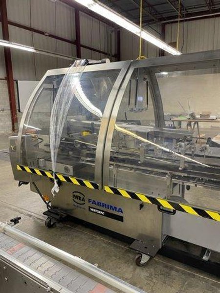 IWKA Fabrima Semi-Automatic Continuous-Motion Vertical Cartoner, Model VP-120, 2005 – Allen Bradley PanelView 600 Control – 8″ Centers, 2005