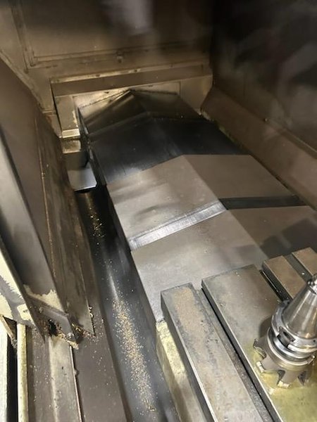 Okuma MC-V4020 VMC, 2005 – Chip Conveyor, 15,000 RPM 32 Slot Tool Changer