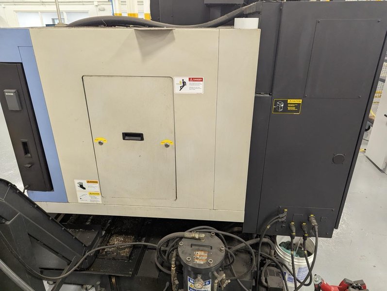 Doosan DNM500 VMC, 2008 – Chip Conveyor