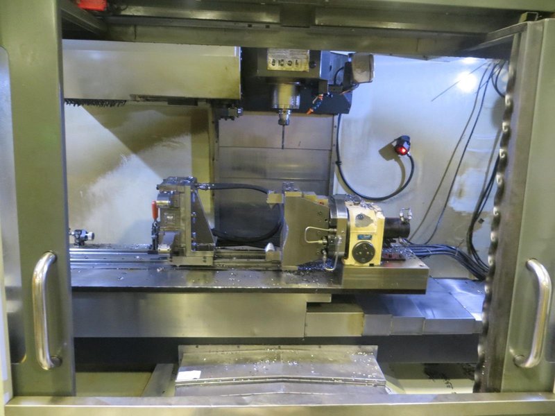 Haas VF-4 CNC Vertical Machining Center, Maincon CNC Control, 4th Drive, 24 ATC, Thru Spindle Coolant, 8100 RPM Gearbox Spindle, New 2013- Auction Item