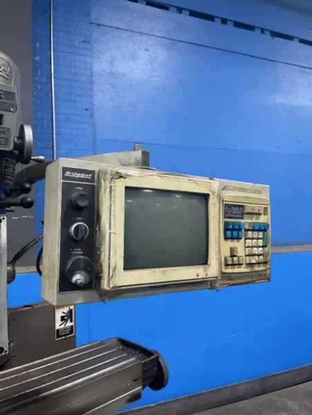 BRIDGEPORT 58” X 11” CNC VERTICAL MILL