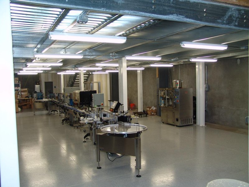 A Packaging Systems Fully Automatic Filling and Labeling Line for Shampoo Bottles, 2009