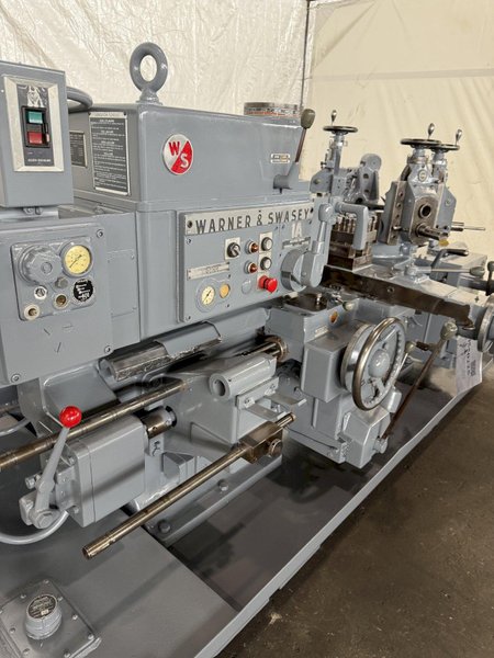 1A WARNER &amp; SWASEY M–3400 SADDLE-TYPE TURRET LATHE W/ TOOLING. STOCK # 0550225
