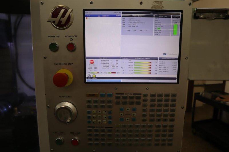 Haas VF-4SS 5-Axis CNC Vertical Machining Center,  12K RPM Spindle, 30 Station SMTC, TSC, Probing, Chip Auger, 4th and 5th Axis Drives with Haas TR-200Y Trunnion Table- NEW 2018- Auction Item