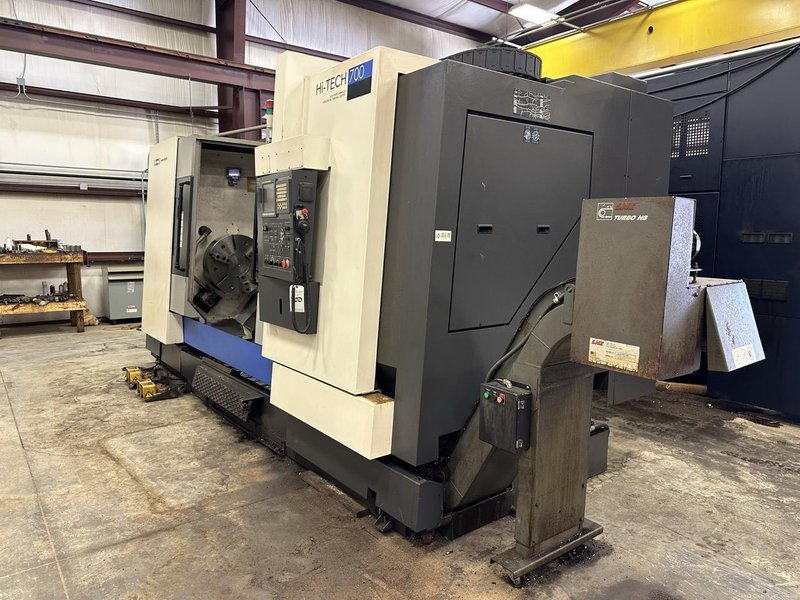 Hwacheon Hi-Tech 700 CNC Lathe, 2012 – 24″ Chuck, Tailstock, Chip Conveyor, Tool Presetter