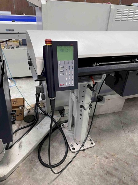 Traub TNL26 CNC Swiss Lathe, 2001- LNS Bar Feeder, Mist Collector, Conveyor, 34 Stations, Live Tools