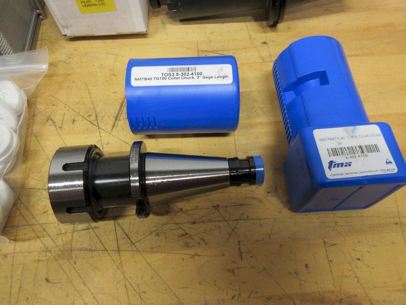 Mill Tool Holders Assorted CAT50, BT40, NMTB40, ER40 Collets, TG100 Collets, and 18x13x6" SST Wire Parts Basket- Auction Item