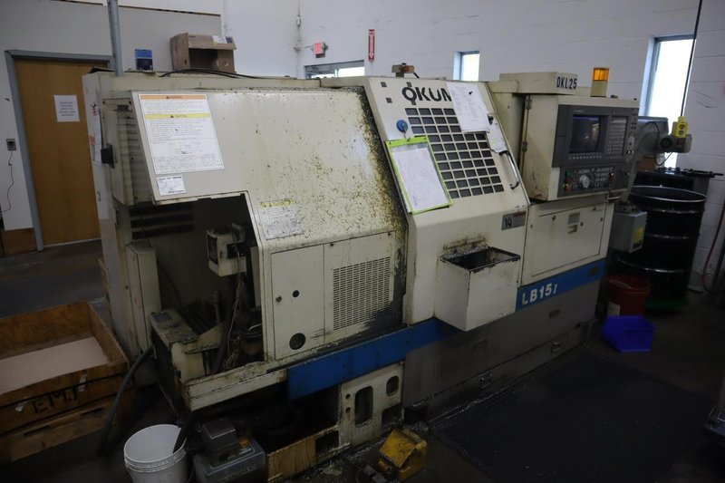Okuma LB15 II CNC Lathe Turning Center, OSP700L CNC, 12 Station Turret, Tailstock, 8&quot; Chuck, Chip Conveyor- Auction Item