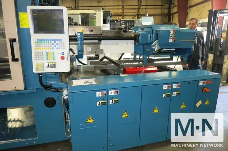 220 TON 6.2 OZ /0.6 OZ ARBURG MODEL 2-COLOR 570C2000-800/60 INJECTION MOLDING  MFG 2005
