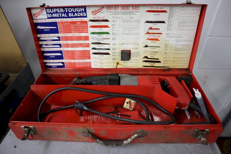 Milwaukee Corded Sawzall in Metal Case with Extra Blades- Auction Item