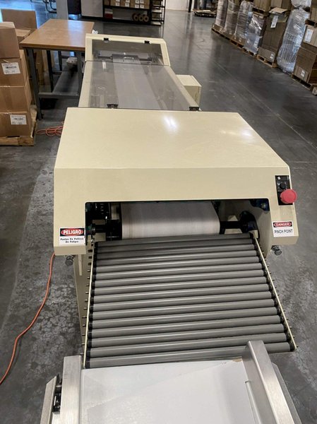 NEDCO E‑Z Fold 2000‑S Automatic Textile Folder – 1,000/hr, Bagging + Heat Seal, OEM Verified
