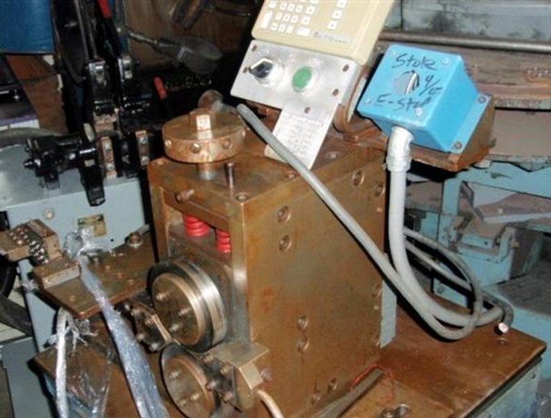 DUAL TORSION SPRING WINDER