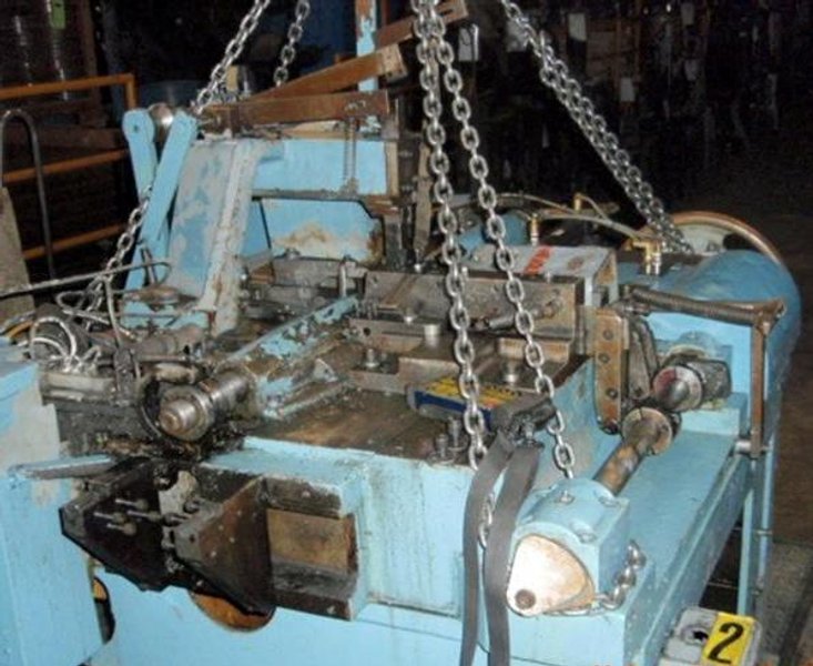 DUAL TORSION SPRING WINDER