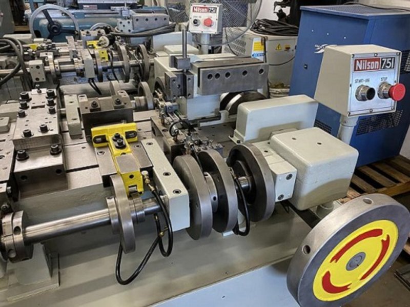 NILSON 751 FOUR SLIDE MACHINE - REBUILT / DUAL SLIDE - COINING
