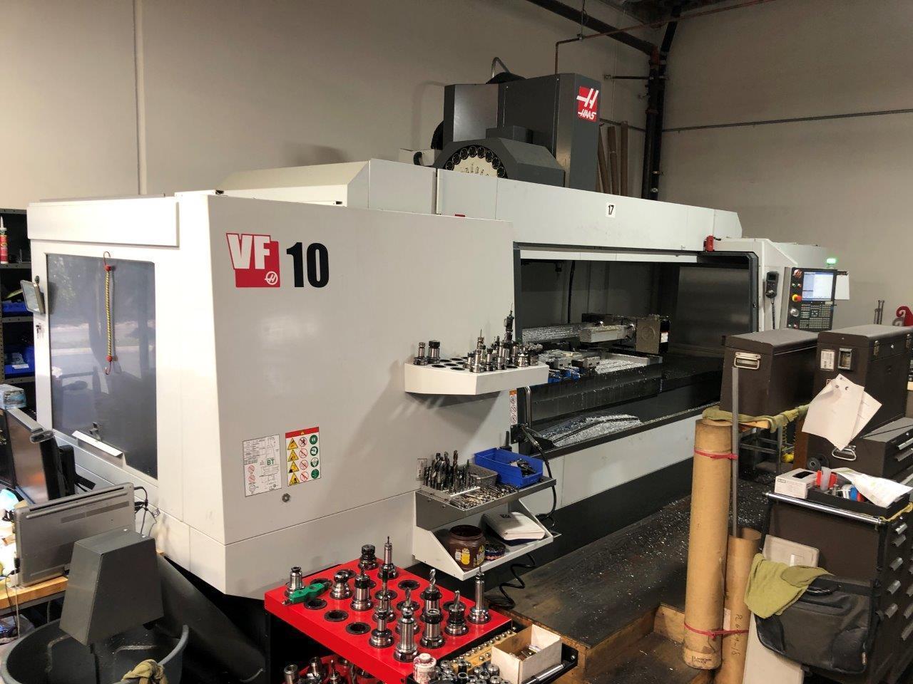 Haas VF-10/40 VMC 2017 with: Haas CNC Control, 4th Axis Drive and Wiring, Haas HRT210-2, 30+1 High Speed Mount Tool Changer, Programmable Coolant and Nozzle, Minimum Quantity Lubrication, Remote Jog H