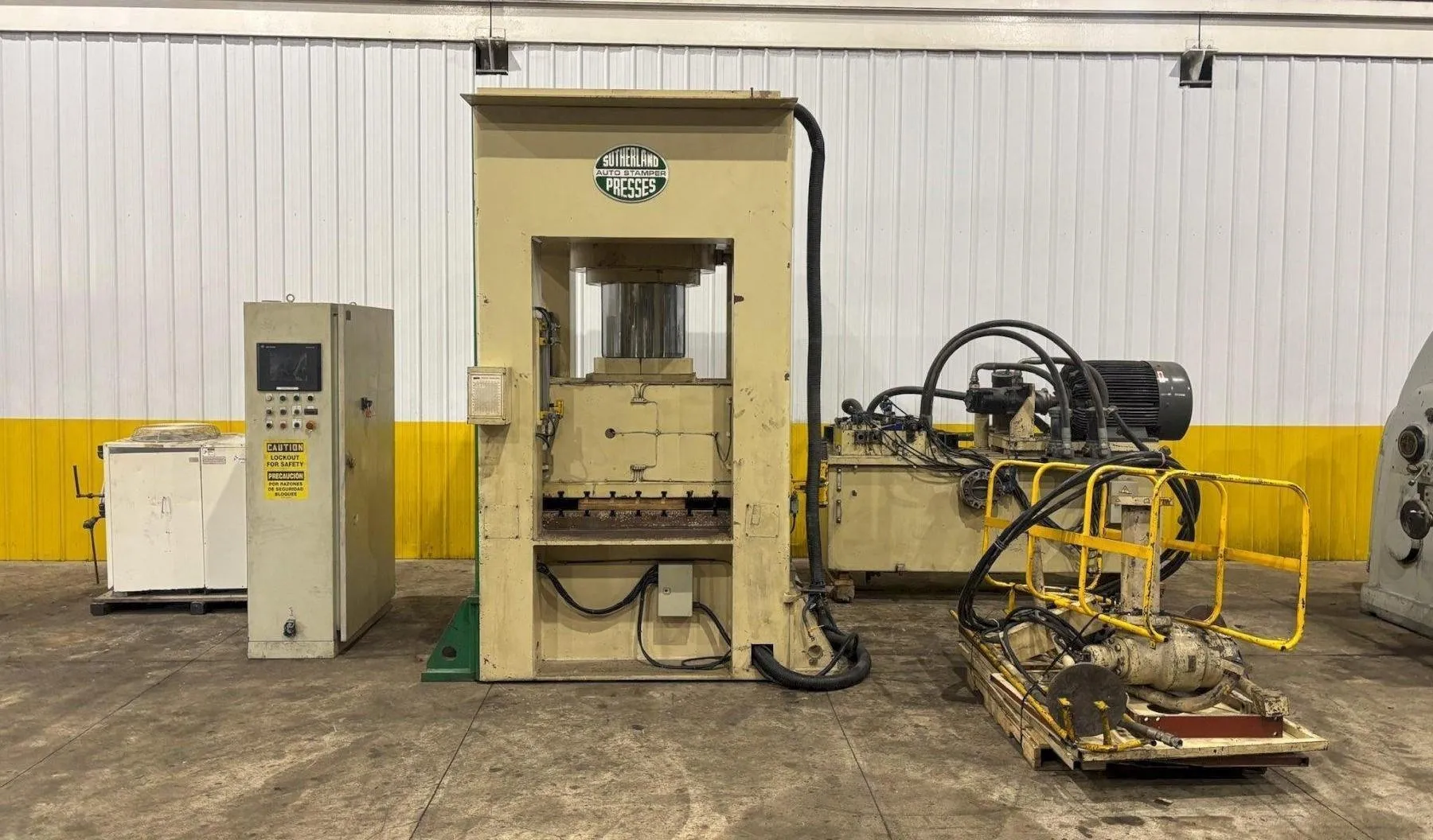 660 TON SUTHERLAND MODEL #HD1 HYDRAULIC 4 POST GUIDED RAM PRESS 15" STROKE STOCK# 4483