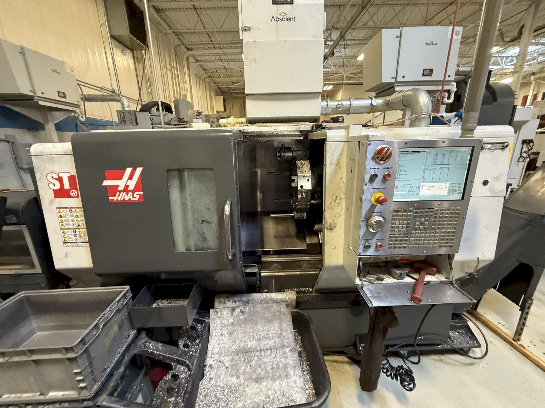 Used 2012 Haas ST-20 CNC Lathe with Bar Feeder For Sale