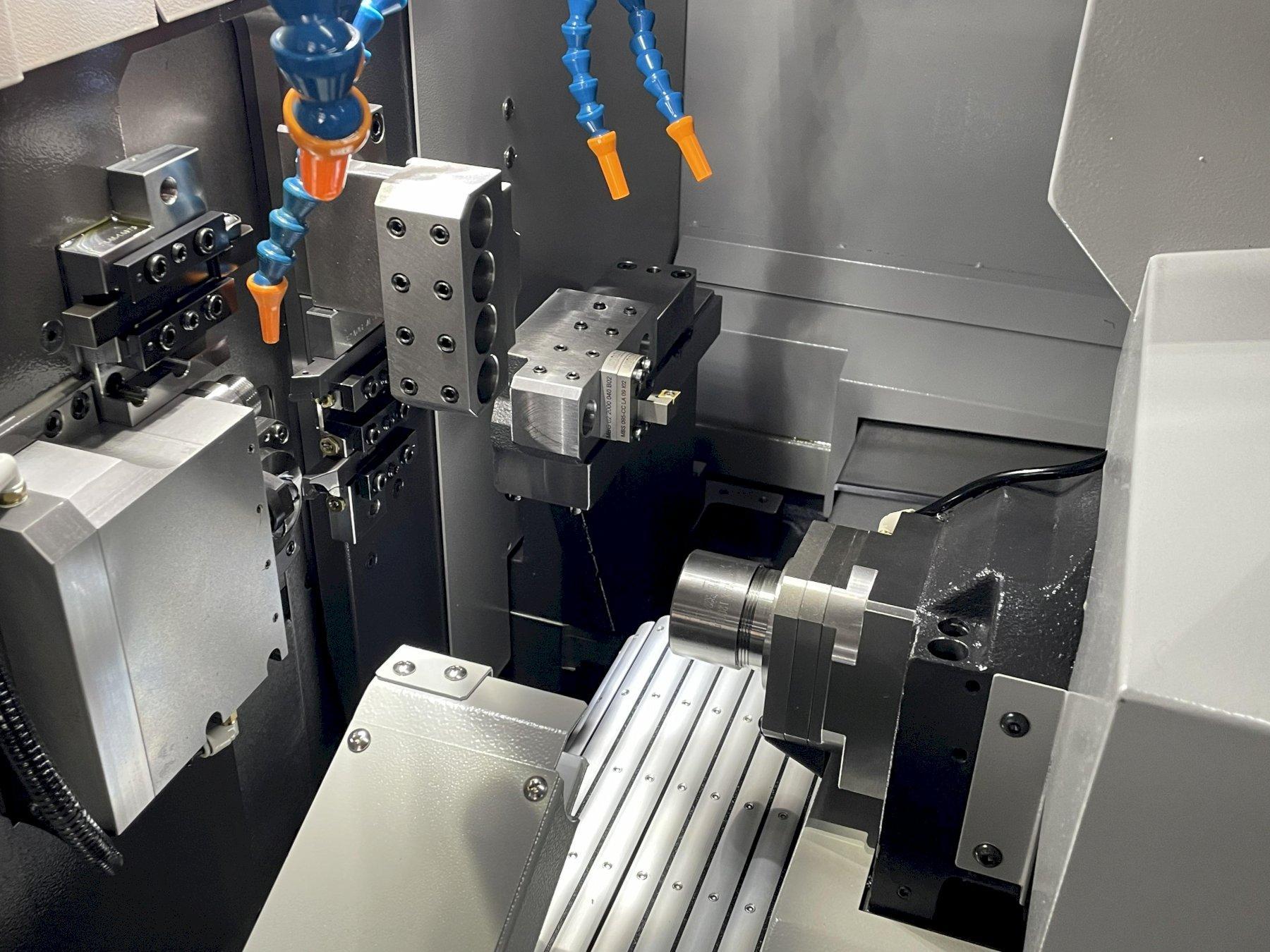 Tsugami Model B0205-VR w/ Fanuc 0i-TF, Fire Trace (5 Lbs), B0-WORK-KIT MKIII (Work Conveyor), Thru Sub Coolant w Pump, Abile Programming Software, Edge Scout 320 Barfeed, Two Channel Sets , ONLY 73 RUN HOURS