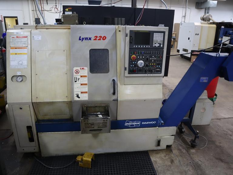 Daewoo Doosan Lynx 220C CNC Turning Center, 8" 3-Jaw Chuck, 12 Station Turret, Parts Catcher, Tool Presetter, Chip Conveyor- Auction Item