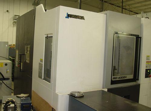OKUMA MB-4000H CNC HORIZONTAL MACHINING CENTER, OSP -P300M CNC Control, X=22.05", Y=22.05", Z=24.61", Cat-40 Taper, 22 HP, 15000 Max Spindle RPM, ATC, Chip Conveyor, Coolant System, New 2013.