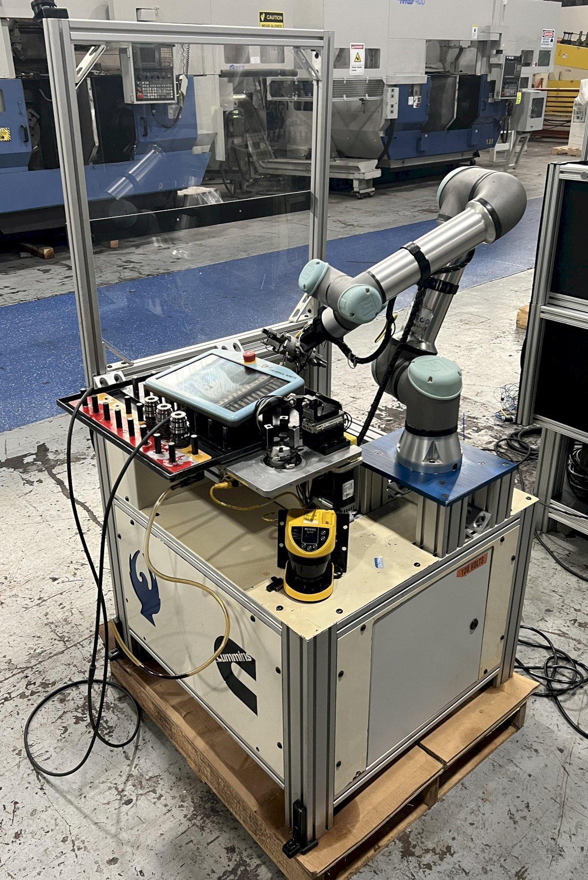 Universal Robots UR5e Cobot With Parts loading base/station. New-2021