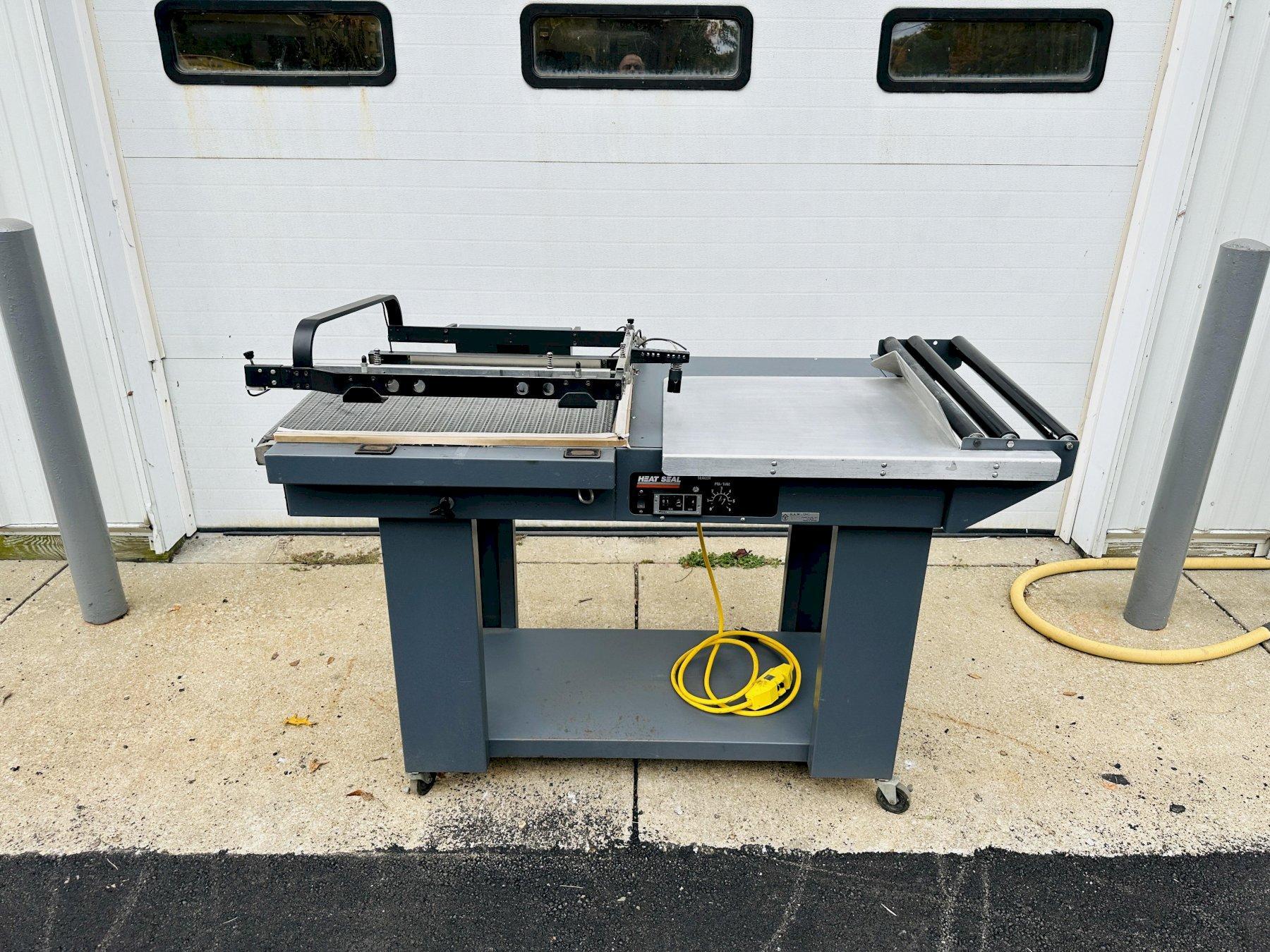 HEAT SEAL Model: HS-2024D Semi-Automatic L-Bar Sealer w/ Powered Outfeed Conveyor
