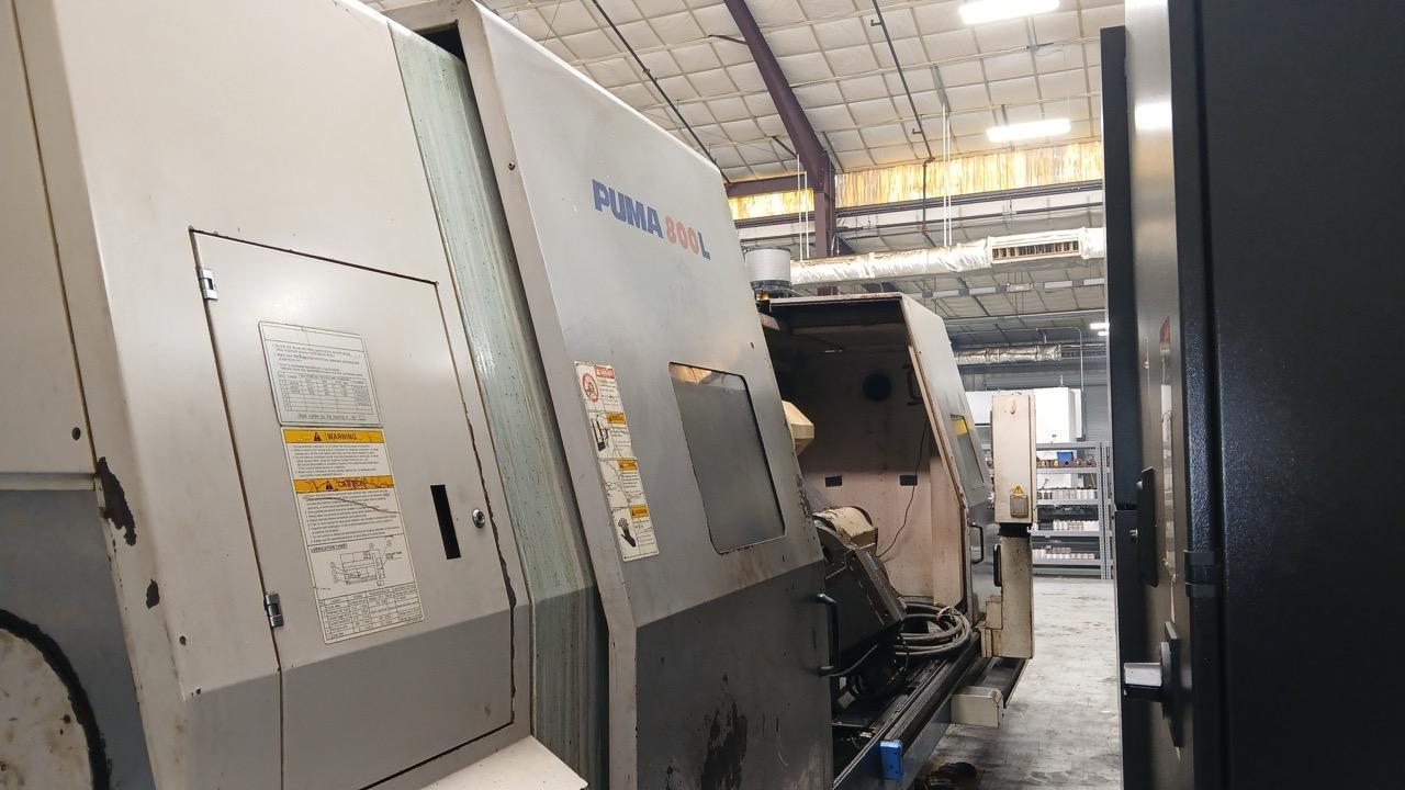 Doosan Puma 800L, 2006 – SMW Hyd Steady, 12″ Big Bore, Chip Conveyor,  Cut Hours 5105