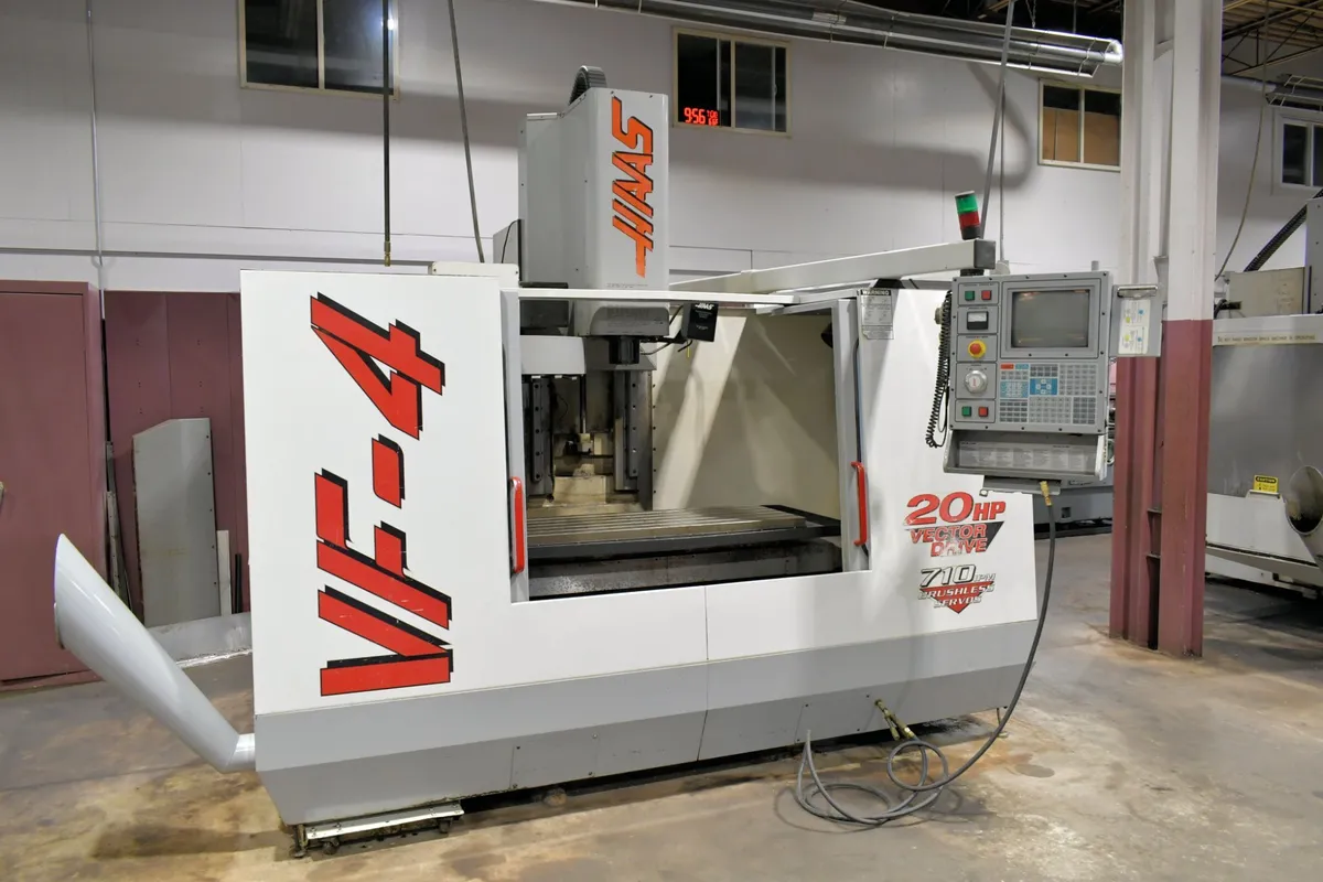 USED HAAS 50" X 20" VERTICAL CNC MACHINING CENTER MODEL VF-4