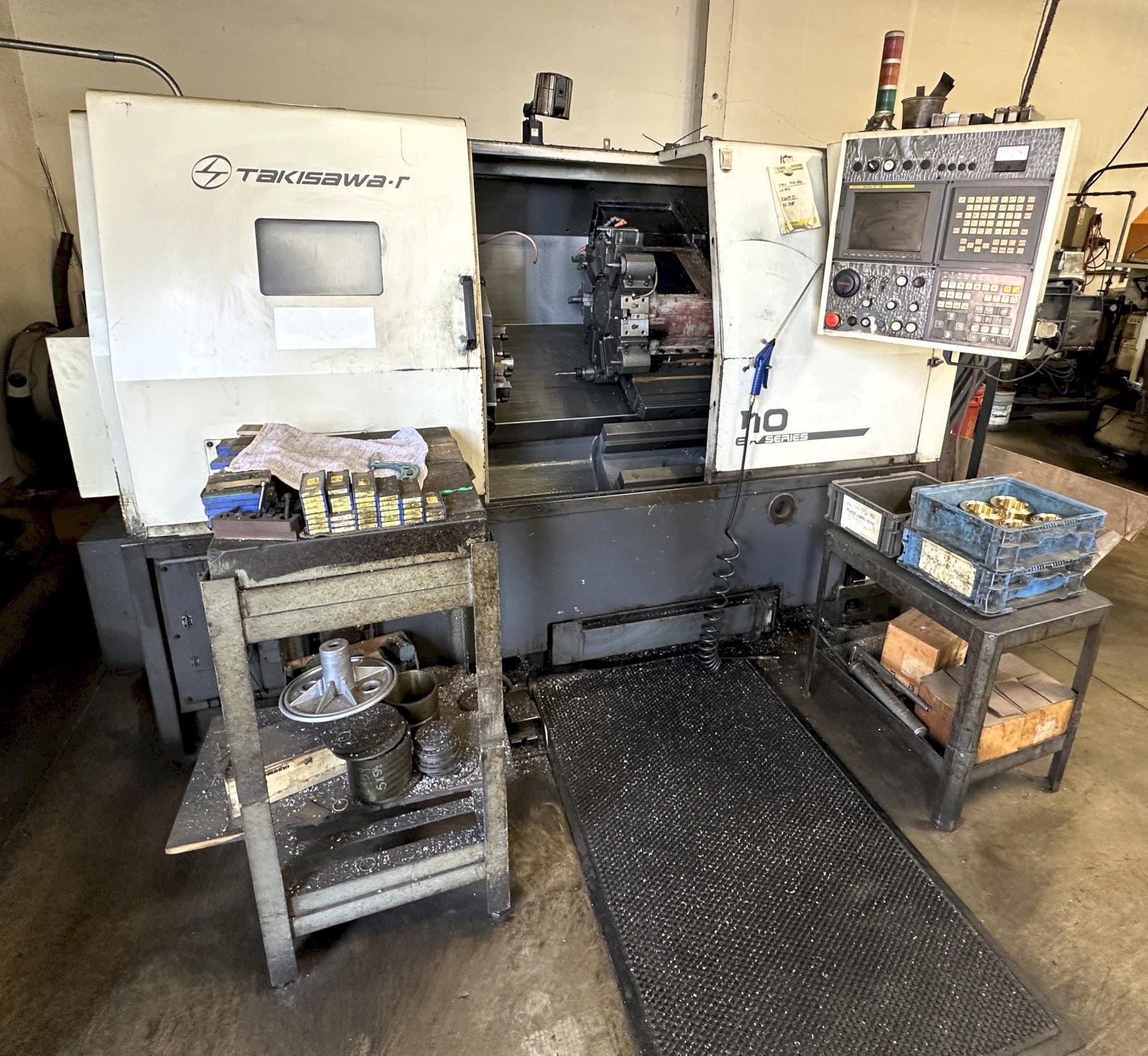 Takisawa-T EX-110 Series CNC Lathe equipped with 3-Jaw Chuck, Coolant Tank and Chip Conveyor