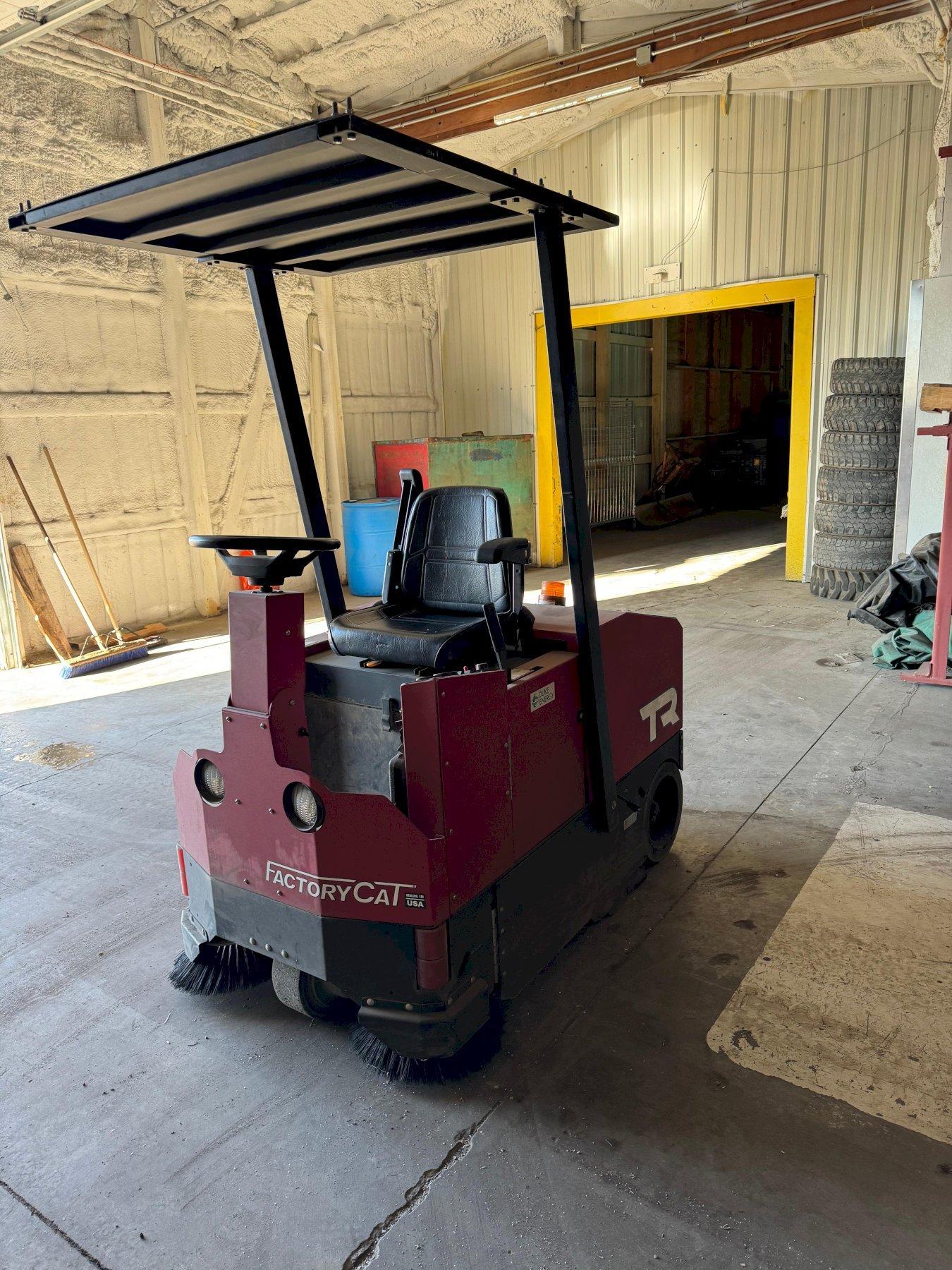 1 - PREOWNED FACTORY CAT RIDER SWEEPER, MODEL #: TR