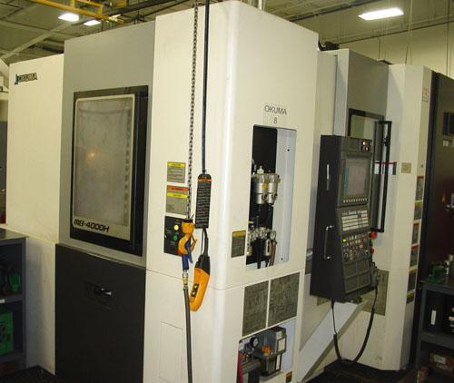 OKUMA MB-4000H CNC HORIZONTAL MACHINING CENTER, OSP -P300M CNC Control, X=22.05", Y=22.05", Z=24.61", Cat-40 Taper, 22 HP, 15000 Max Spindle RPM, ATC, Chip Conveyor, Coolant System, New 2013.