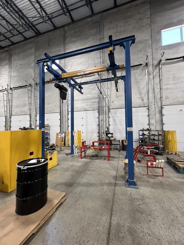 4000 lb. Gorbel Free Standing Crane System with power Chain Hoist.  Travels of 62" x 78" x 120" under the hook.  Like new condition.