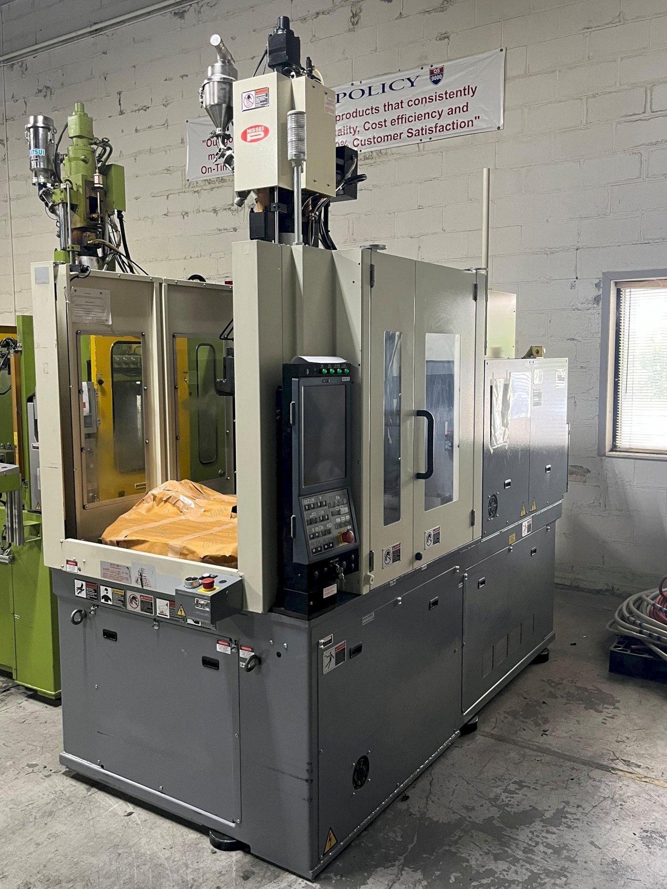 Nissei Used TNX50RIII5V Vertical Injection Molding Machine, Rotary Table, 53 US Ton, 1.66 oz.,  yr. 2018
