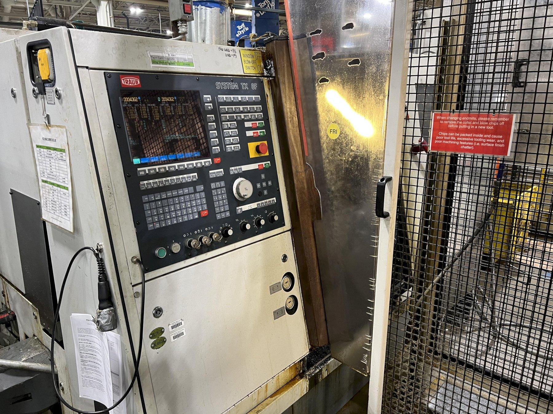 TRAUB CNC LATHE, MODEL TNC 42/65DGY, MAIN AND SUB SPINDLES, UPPER AND LOWER TURRETS, CHIP CONVEYOR, TX 8F CONTROL, 1997