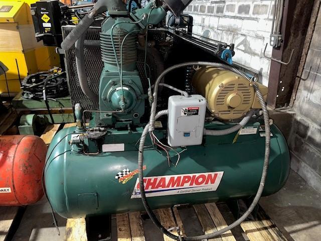 15 HP Champion air compressor STOCK# 3630