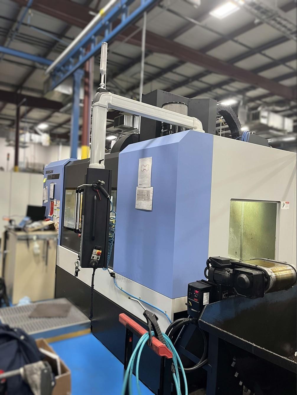 Doosan DNM750-II Vertical Machining Center w/ Fanuc I Series Plus Control, Lyndex Nikken CNC260LFA-M Rotary Table w/ Tailstock, LNS Turbo Magnetic Chip Conveyor, Through Spindle Coolant (290 PSI), Royal Filter Master FX1200 Mist Collector, Hydcool Chiller, OMI-2T Renishaw Auto-Work Piece Measurement, Renishaw Probe, Doosan Tool Load Monitoring, AI Contour Control (AICC) 200 Blocks, Embedded Ethernet, Transformer