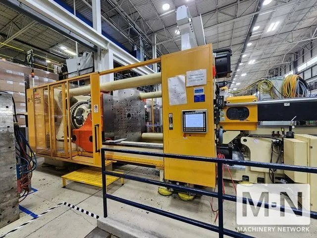 1100 TON 210 OZ HUSKY MODEL H1000RS135-115 INJECTION MOLDING MACHINE MFG 2005