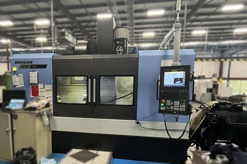 Doosan DNM750-II Vertical Machining Center w/ Fanuc I Series Plus Control, Lyndex Nikken CNC260LFA-M Rotary Table w/ Tailstock, LNS Turbo Magnetic Chip Conveyor, Through Spindle Coolant (290 PSI), Royal Filter Master FX1200 Mist Collector, Hydcool Chiller, OMI-2T Renishaw Auto-Work Piece Measurement, Renishaw Probe, Doosan Tool Load Monitoring, AI Contour Control (AICC) 200 Blocks, Embedded Ethernet, Transformer