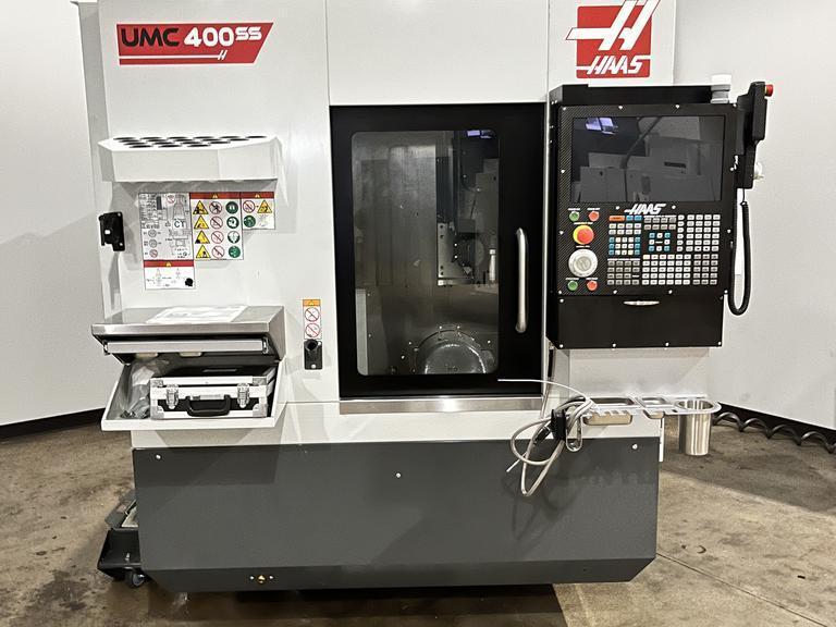 Haas UMC-400SS CNC 5-Axis Vertical Machining Center, Ct40, 12K RPM, 30 ATC, Probing, 230mm Diameter Work Platter, High Speed Machining, Programmable Coolant Nozzle, Chip Auger