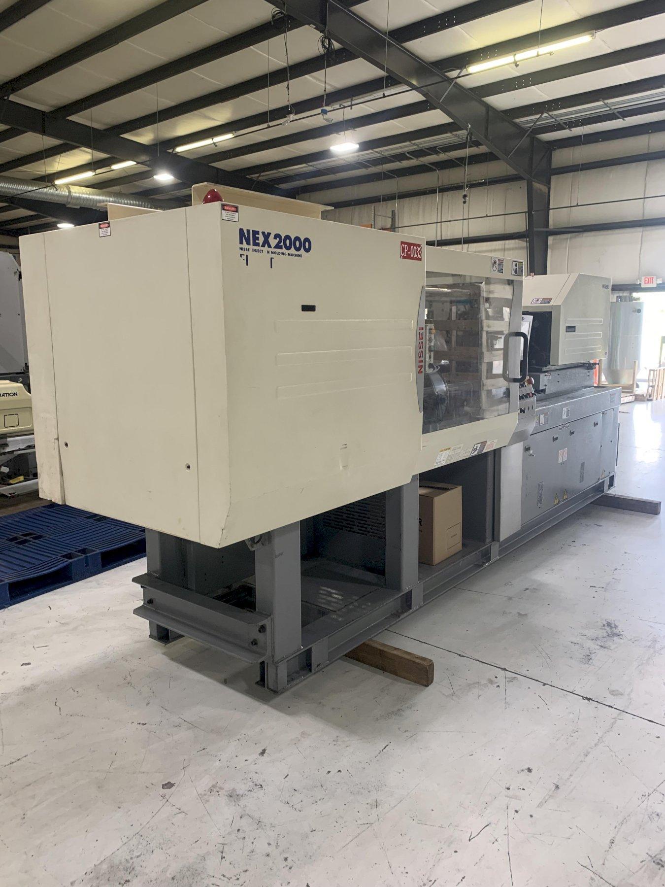 Nissei Used NEX2000-12E Injection Molding Machine, 121 ton, Yr. 2005, 2.6 oz.