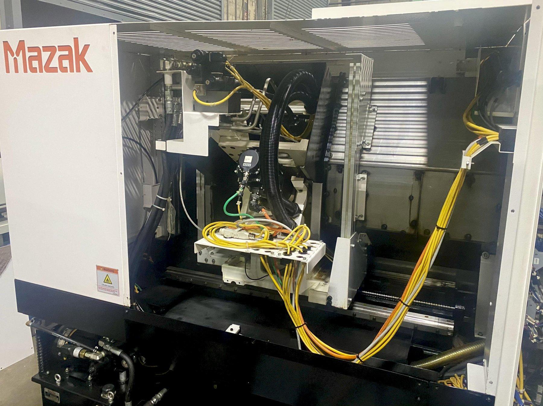 MAZAK QTU-250 CNC TURNING CENTER, Mazatrol Smooth CNC Control, 8" 3-Jaw Chuck, 27" Swing, 24" Between Centers, 2" Bar Capacity, 20 HP Spindle, 4500 RPM, 12-Position Turret, Tool Setter, Auto Door, Chip Conveyor, New 2017.
