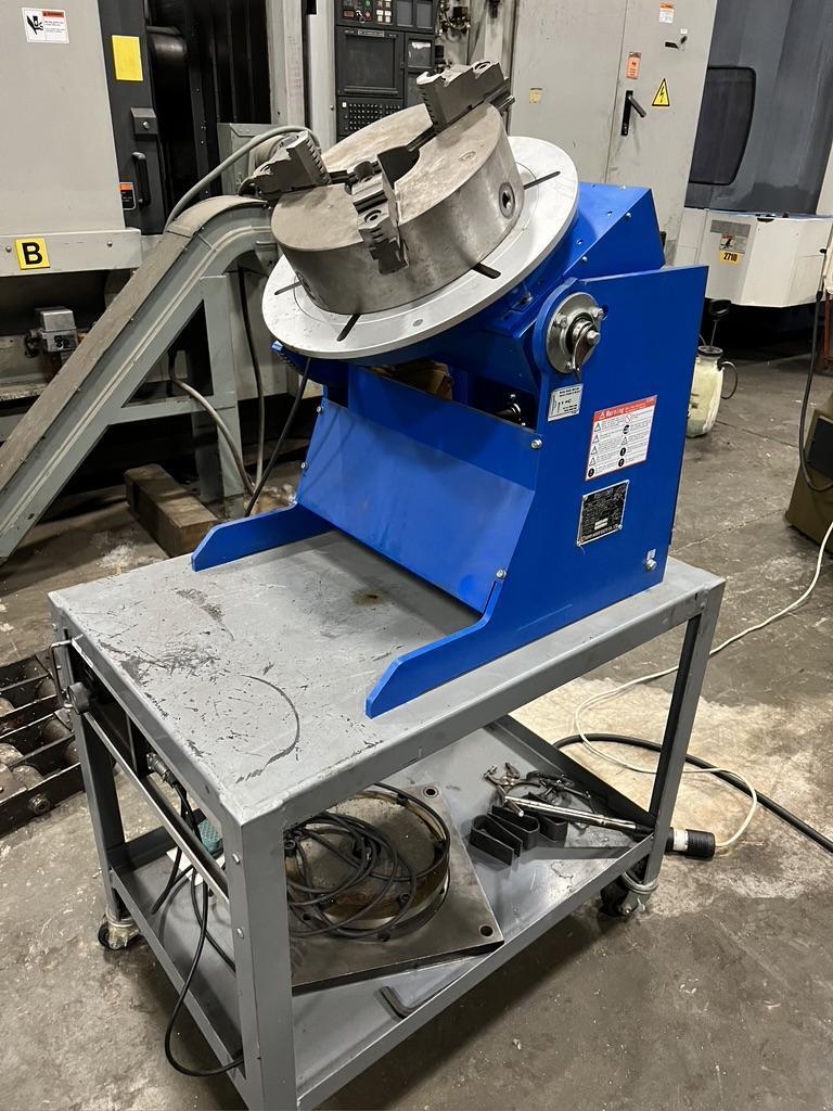 660 lb (300 kg) Koike, Model LD-300R,  17.7" table, 12" 3 jaw chuck, .23 - 46 rpm rotation, 0 - 90 tilt, new 2006