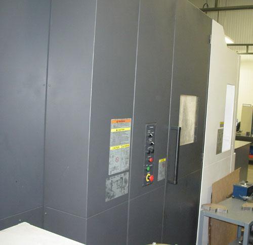 OKUMA MB-4000H CNC HORIZONTAL MACHINING CENTER, OSP -P300M CNC Control, X=22.05", Y=22.05", Z=24.61", Cat-40 Taper, 22 HP, 15000 Max Spindle RPM, ATC, Chip Conveyor, Coolant System, New 2013.