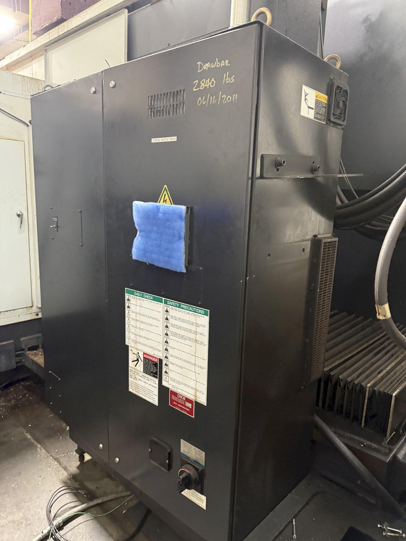 OKK, MODEL KCV 800 CNC VERTICAL MACHINING CENTER, 120" X, 33" Y, 28" Z, 40 ATC, 12,0000 RPM, 2007, EXC.