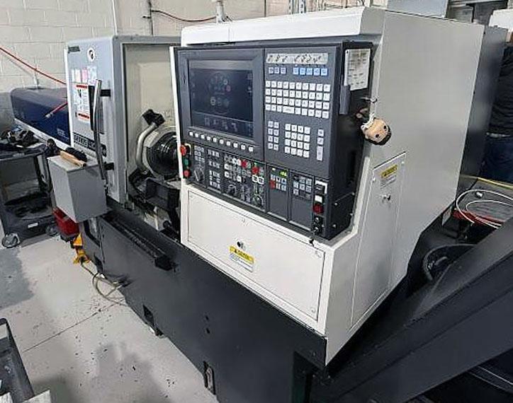 2018 Okuma GENOS L300-M-e CNC Lathe w/ Bar Feeder